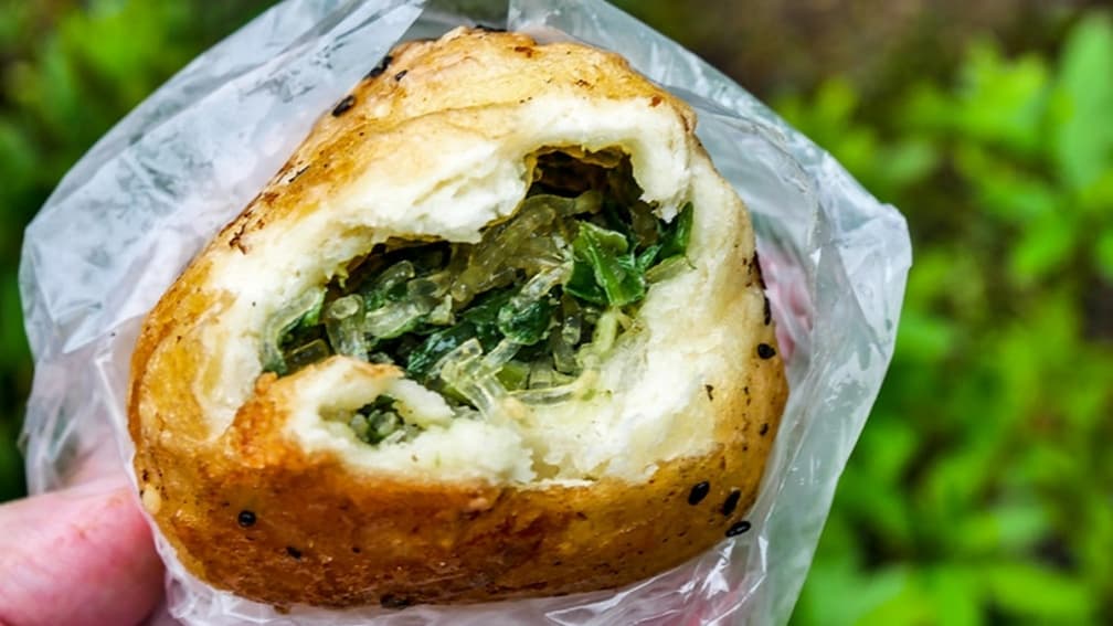 韭菜包調味超棒，中和了韭菜的特殊味道。（圖片來源：鄉民食堂）