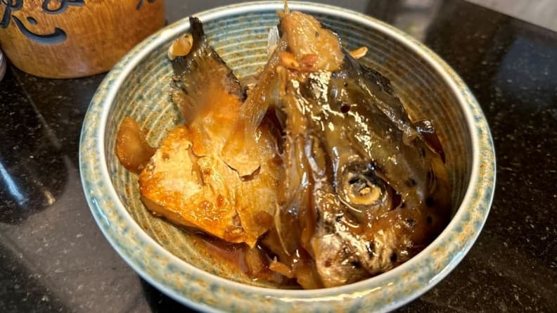 燉煮魚頭鮮美好吃，讓人印象深刻。（圖片來源：加園）