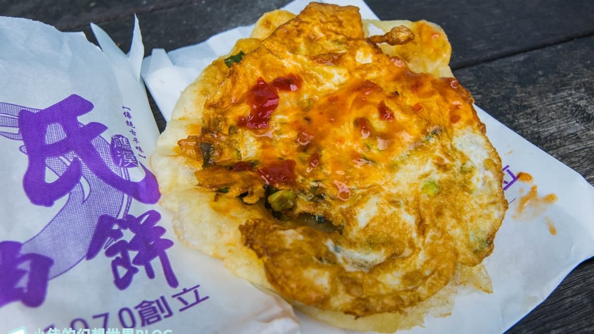 蔥油餅滿推薦要點加蛋的，會讓口感層次更豐富。（圖片來源：小佳的幻想世界）