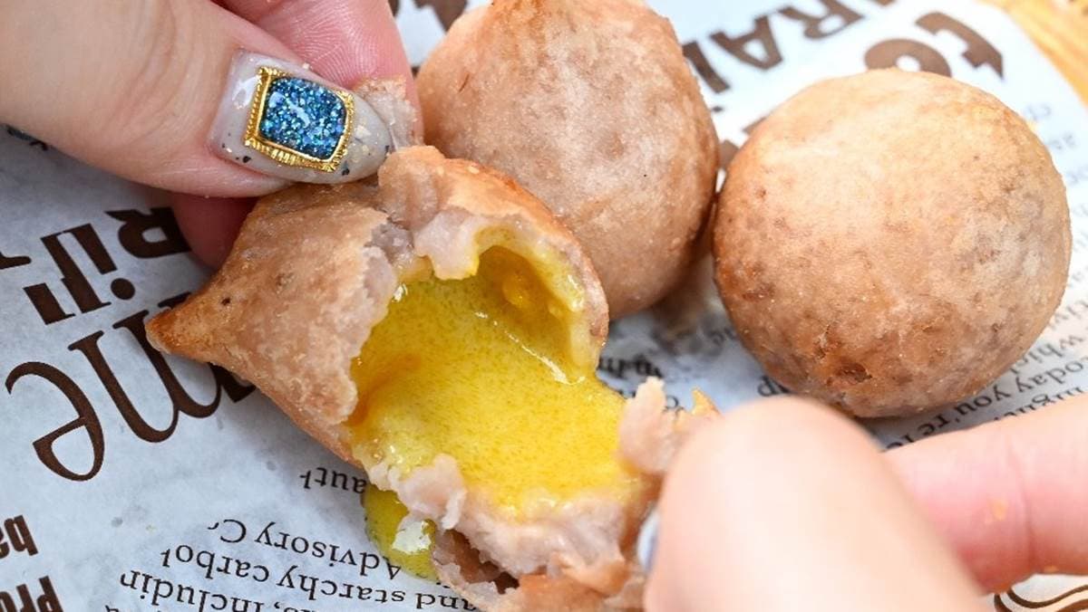 芋泥球一咬就爆漿，滿滿的流沙餡超過癮。（圖片來源：糖糖's 享食生活）