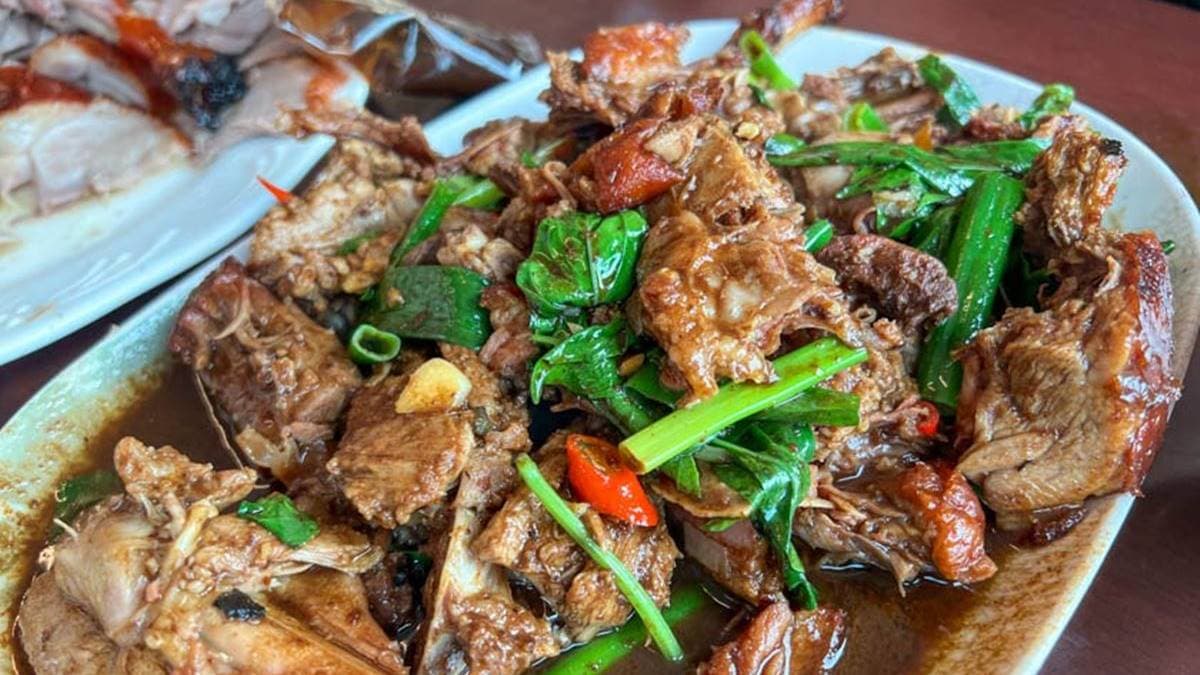 炒鴨架醬汁相當下飯，建議要點辣味最過癮。（圖片來源：漢堡食嚥日記）