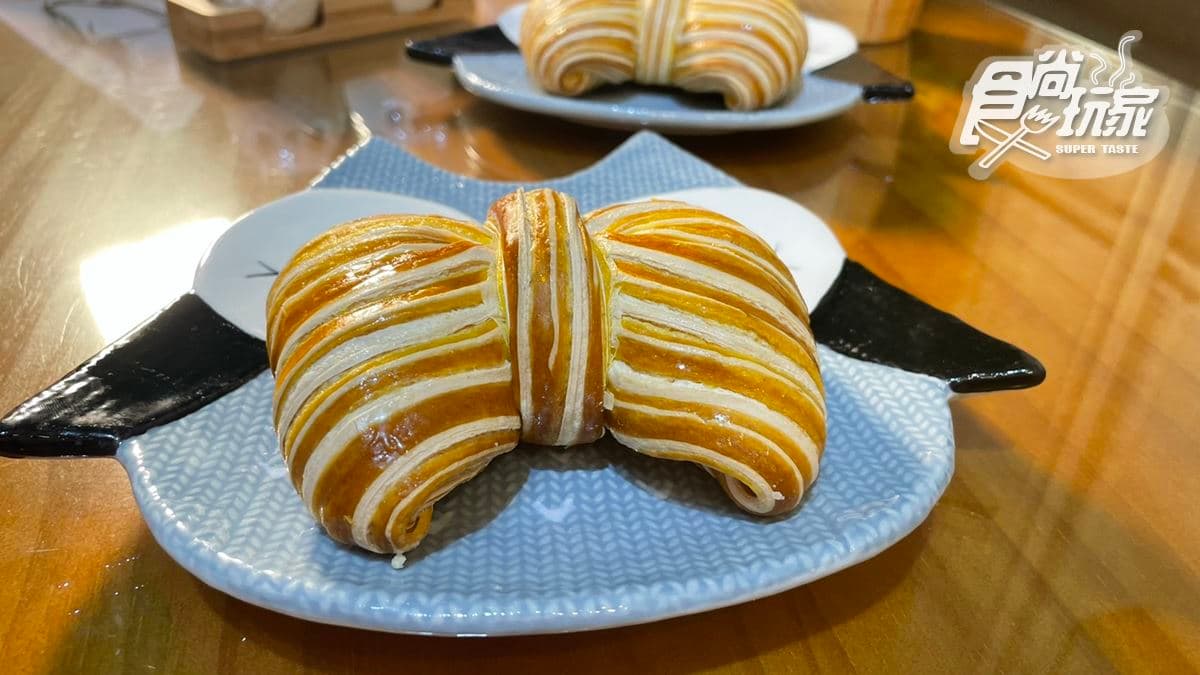 季節限定版蝴蝶結可頌「芒果冰芯啾啾」，內餡包入新鮮芒果卡士達醬。