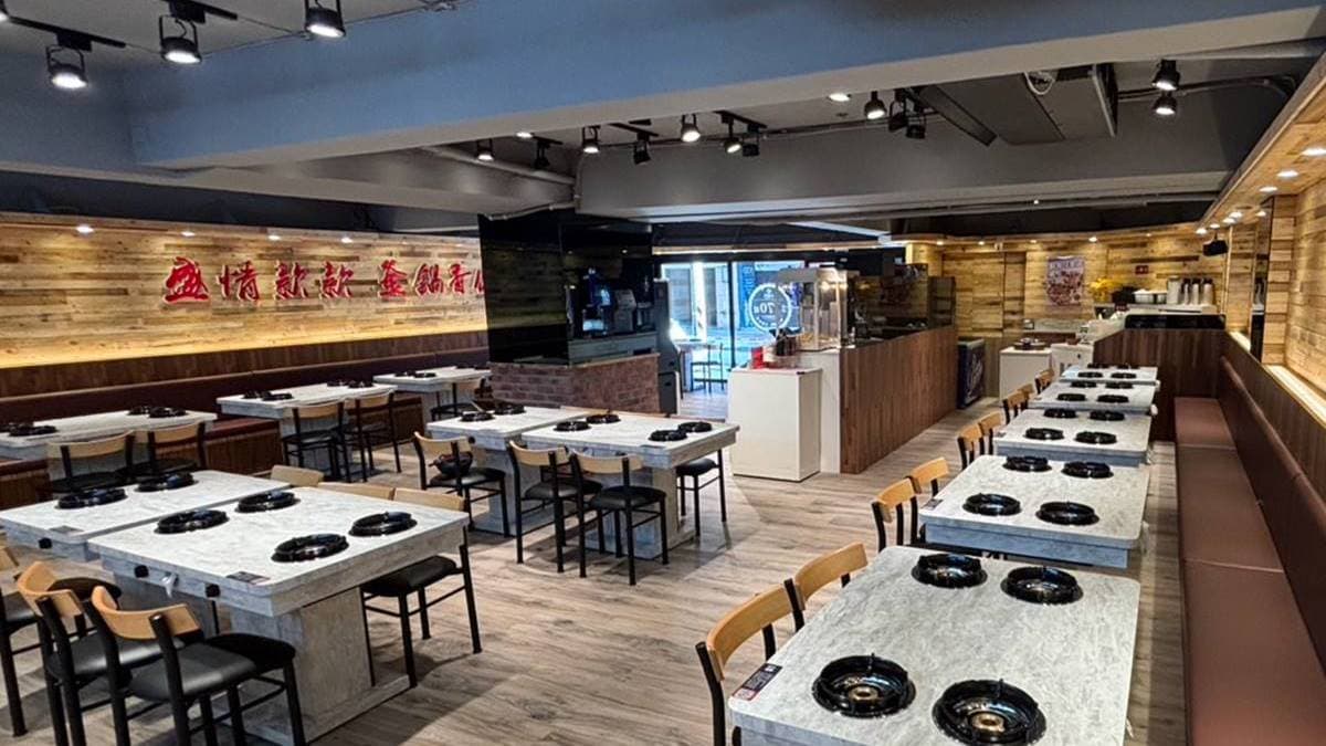「六扇門時尚湯鍋」台北農安店，店內座位多且寬敞，空間明亮新穎。（圖片來源：六扇門）