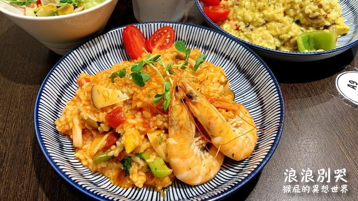海鮮燉飯，口味很不錯，濃郁好吃，料滿多的。（圖片來源：猴屁的異想世界）