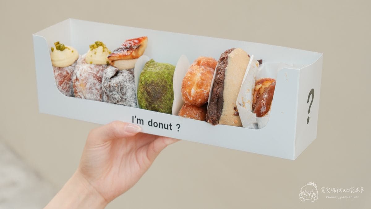 外帶盒設計精美，甜甜圈一字排開超療癒。（圖片來源：貪食瑞秋a口袋名單）