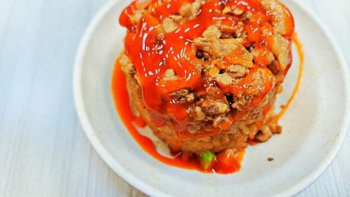 筒仔米糕，Q彈的糯米搭配上特製醬料。（圖片來源：妮妮女王的美食旅遊親子後花園）